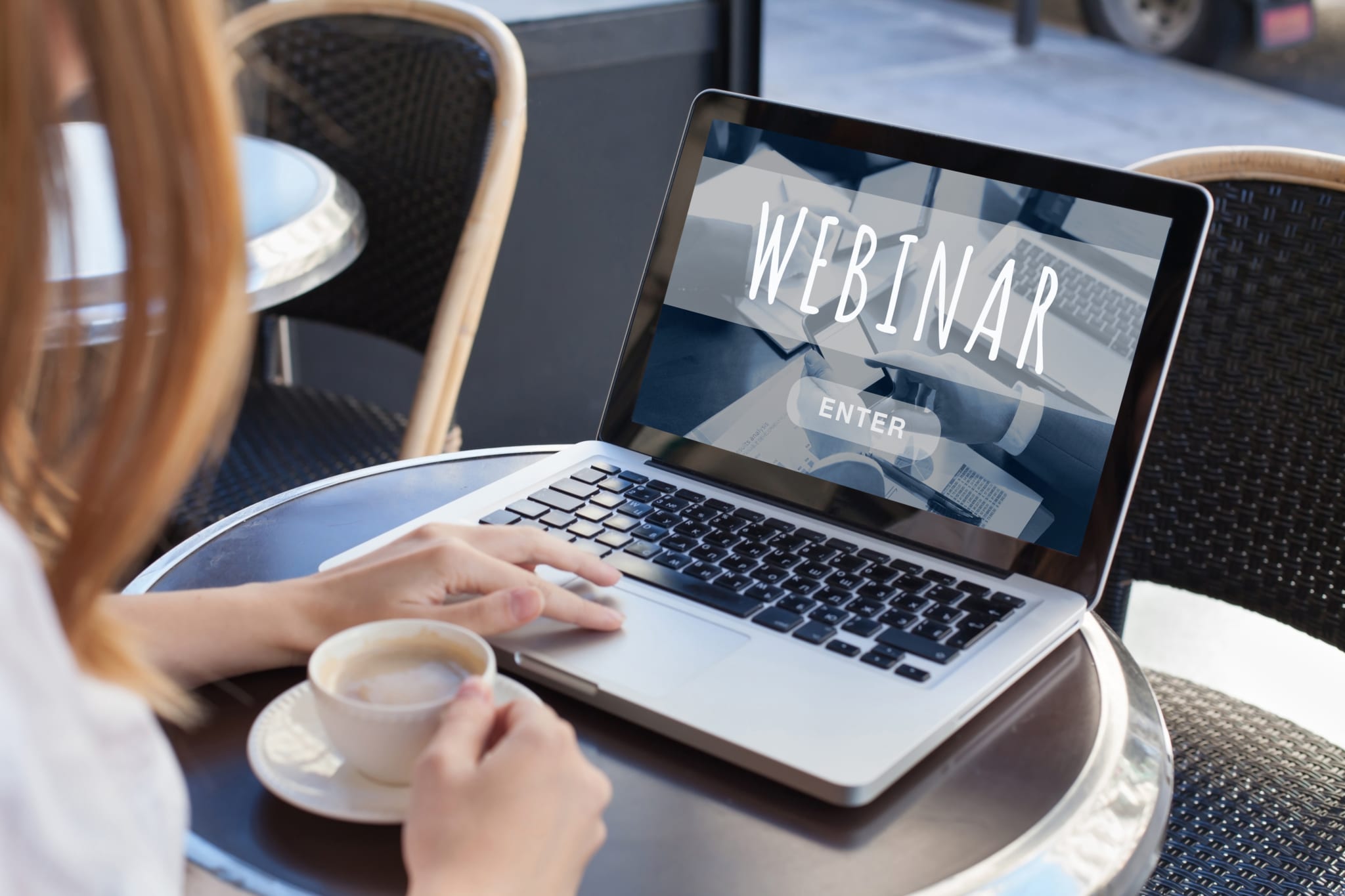 Woman joining a webinar on a laptop